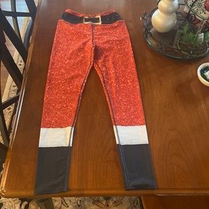 Christmas leggings size medium. Never worn